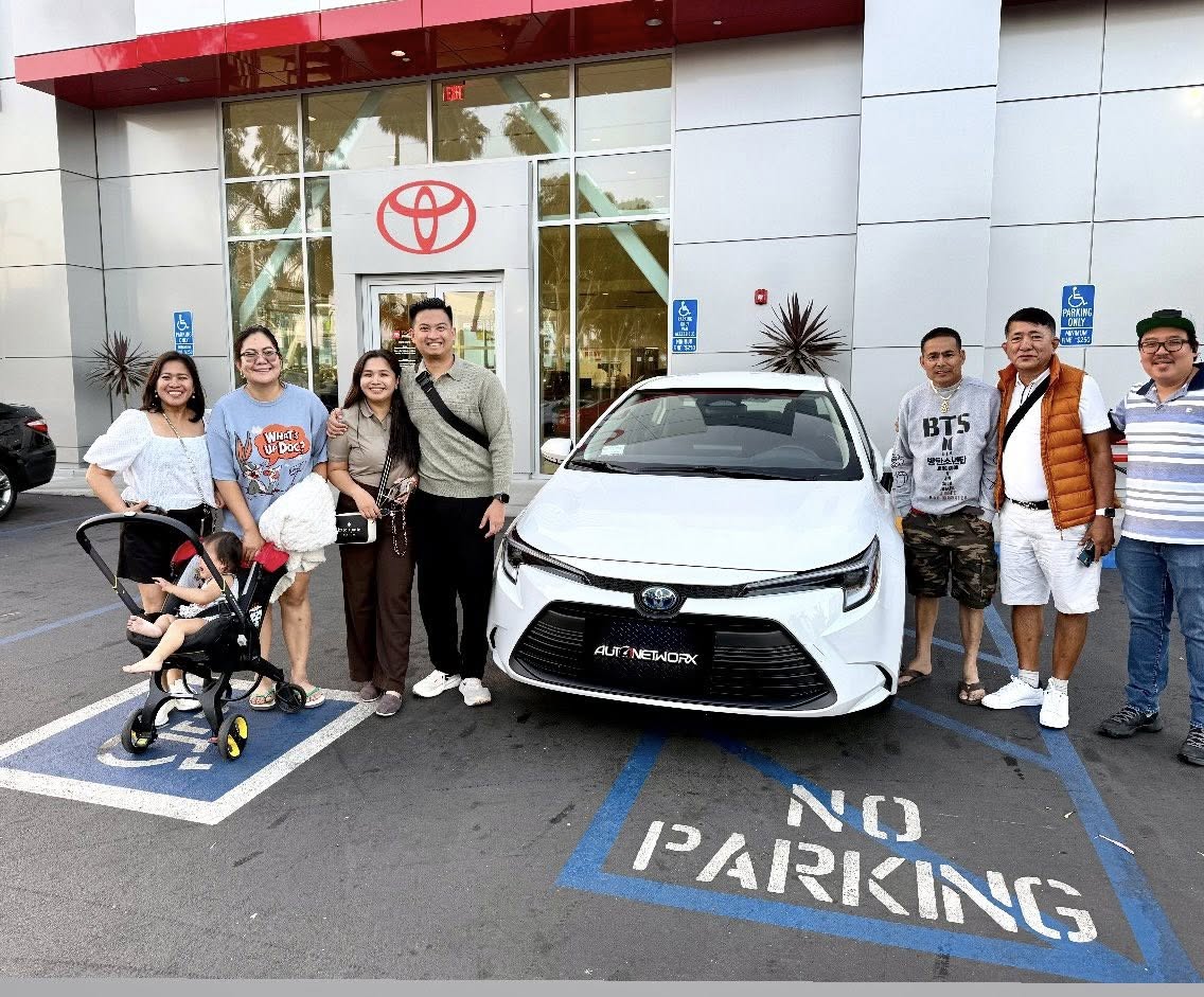 Happy Auto Networx clients with their new Toyota